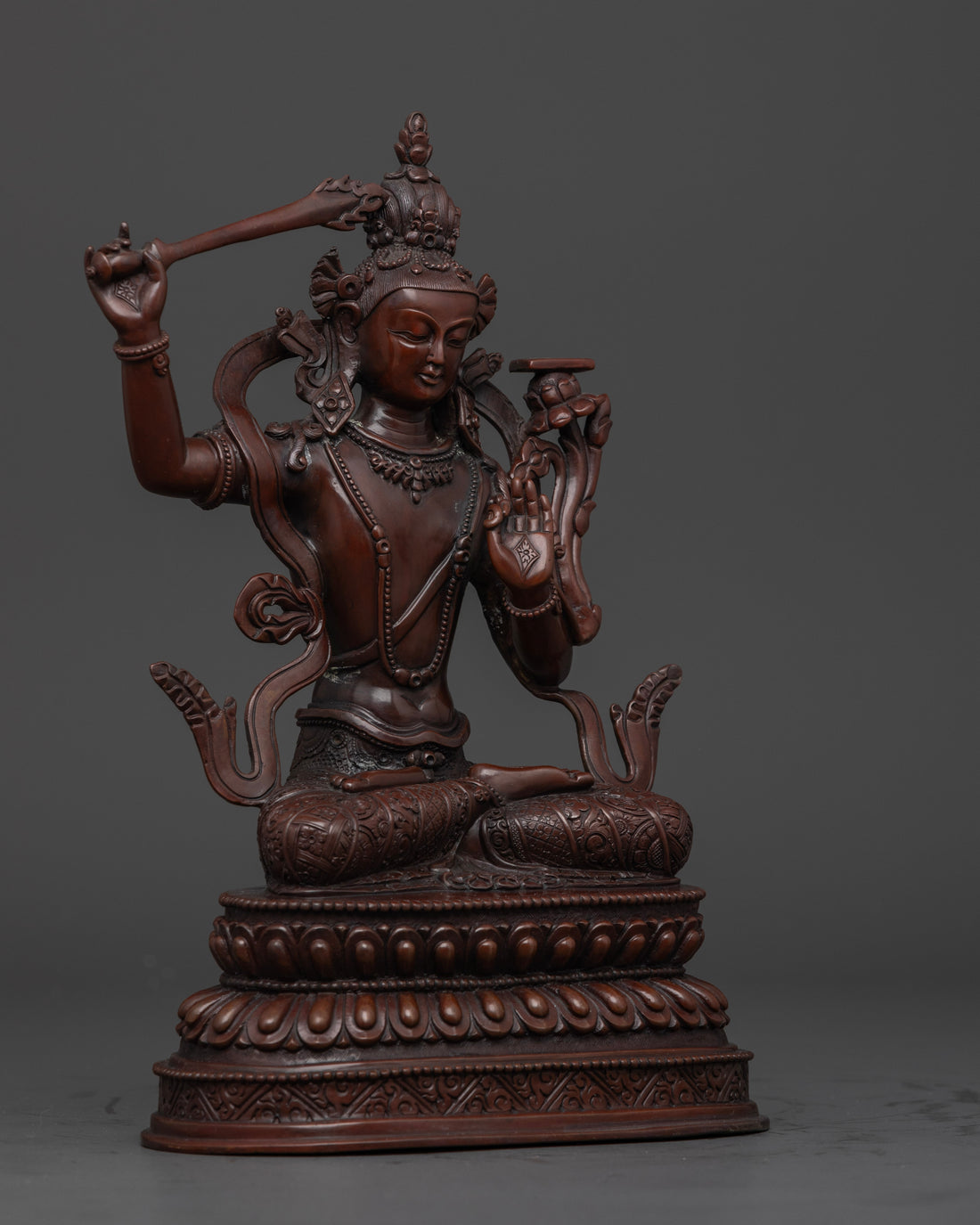 another side view of durable oxidized manjushri statue