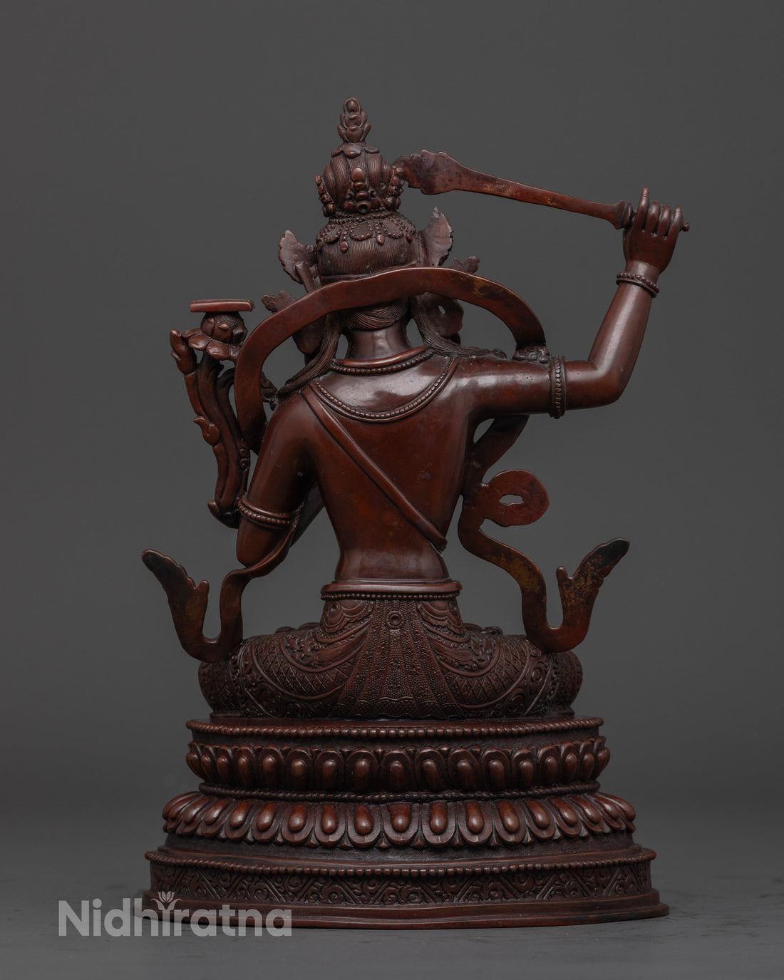 back view of outdoor home decor oxidized manjushri statue