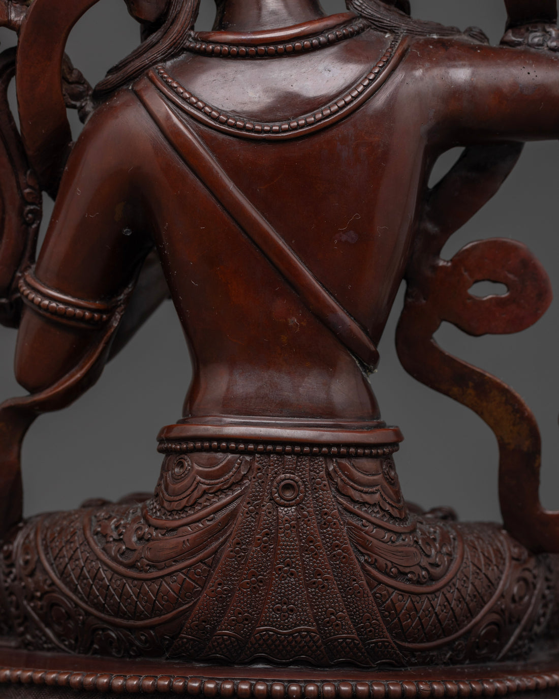 back view of torso of oxidized manjushri statue