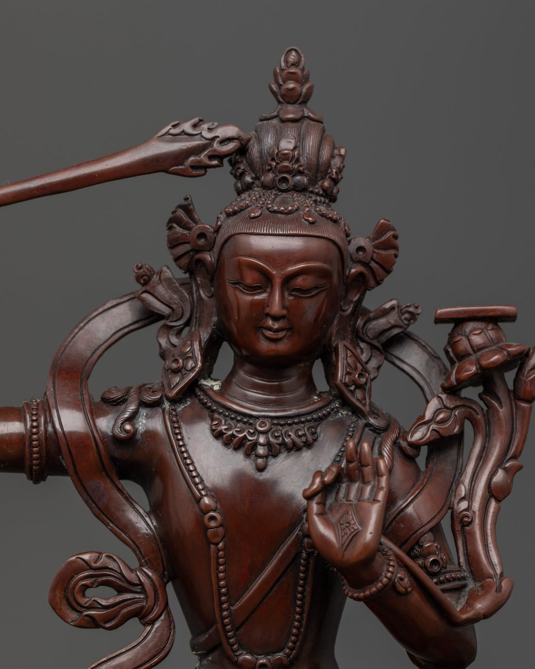 face of long-lasting oxidized manjushri statue