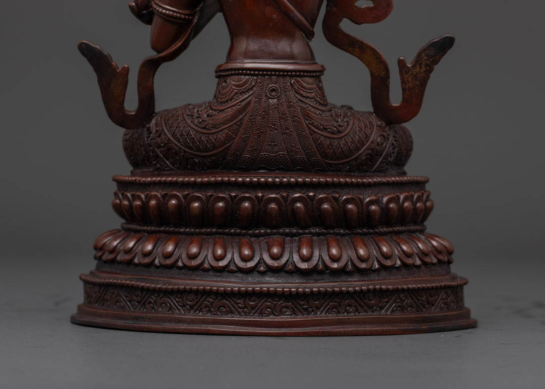 back view of oxidized manjushri statue lotus seat which holds a moon disc