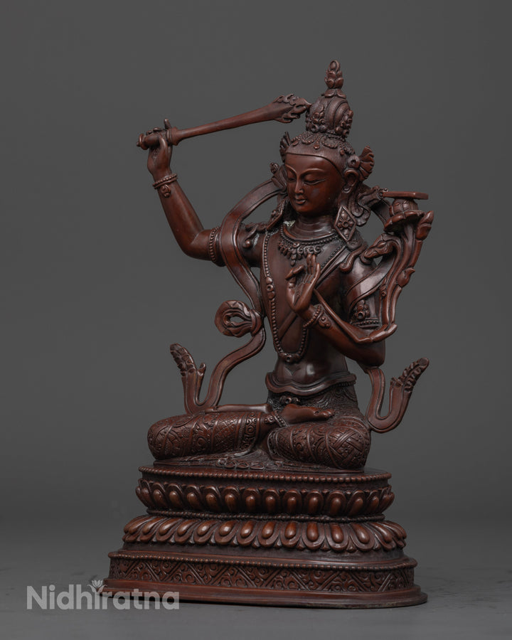 side view of oxidized manjushri statue for wisdom