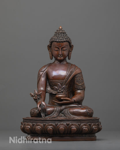 oxidized medicine buddha front view with monk robe and myrobalan in earthy copper finish