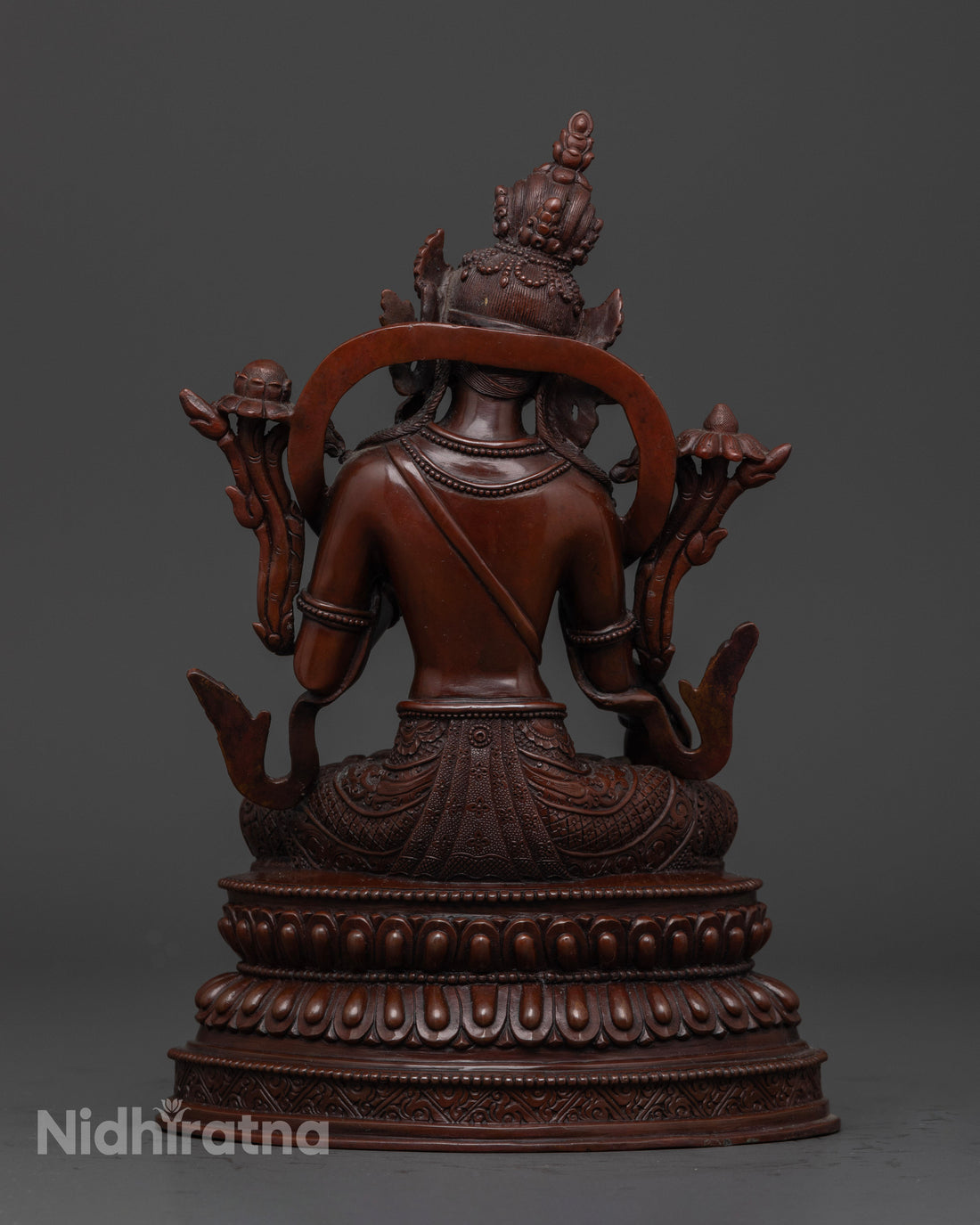 back view of masterfully handcrafted oxidized brown white tara statue