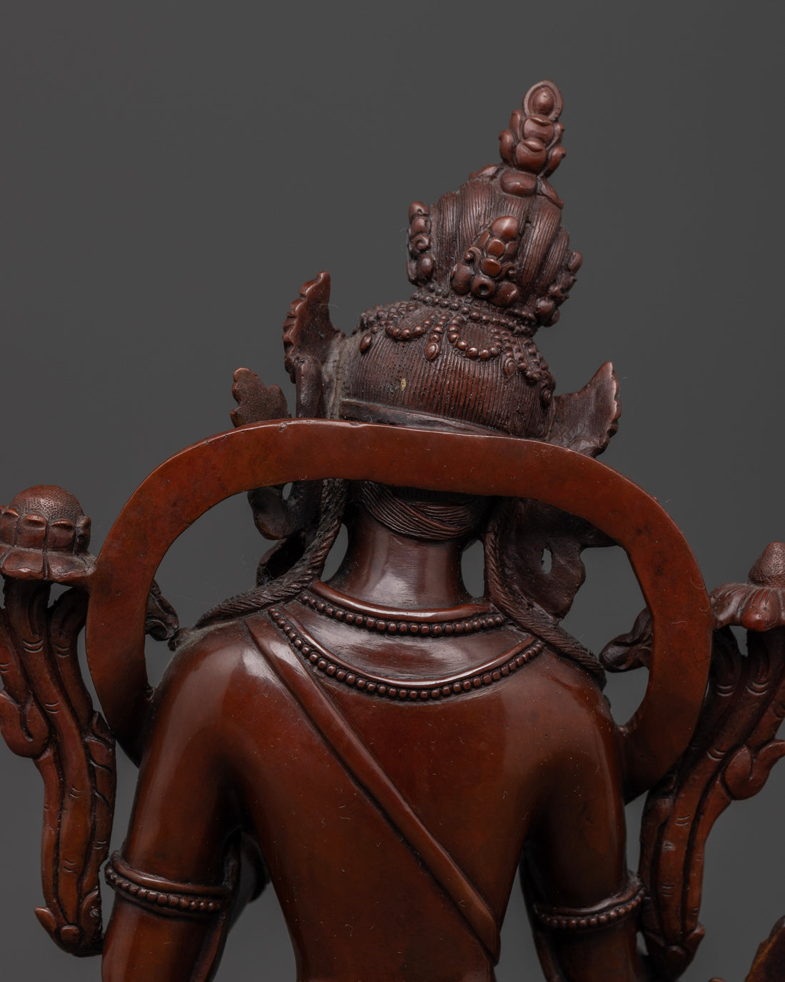 back view of hair of oxidized white tara statue