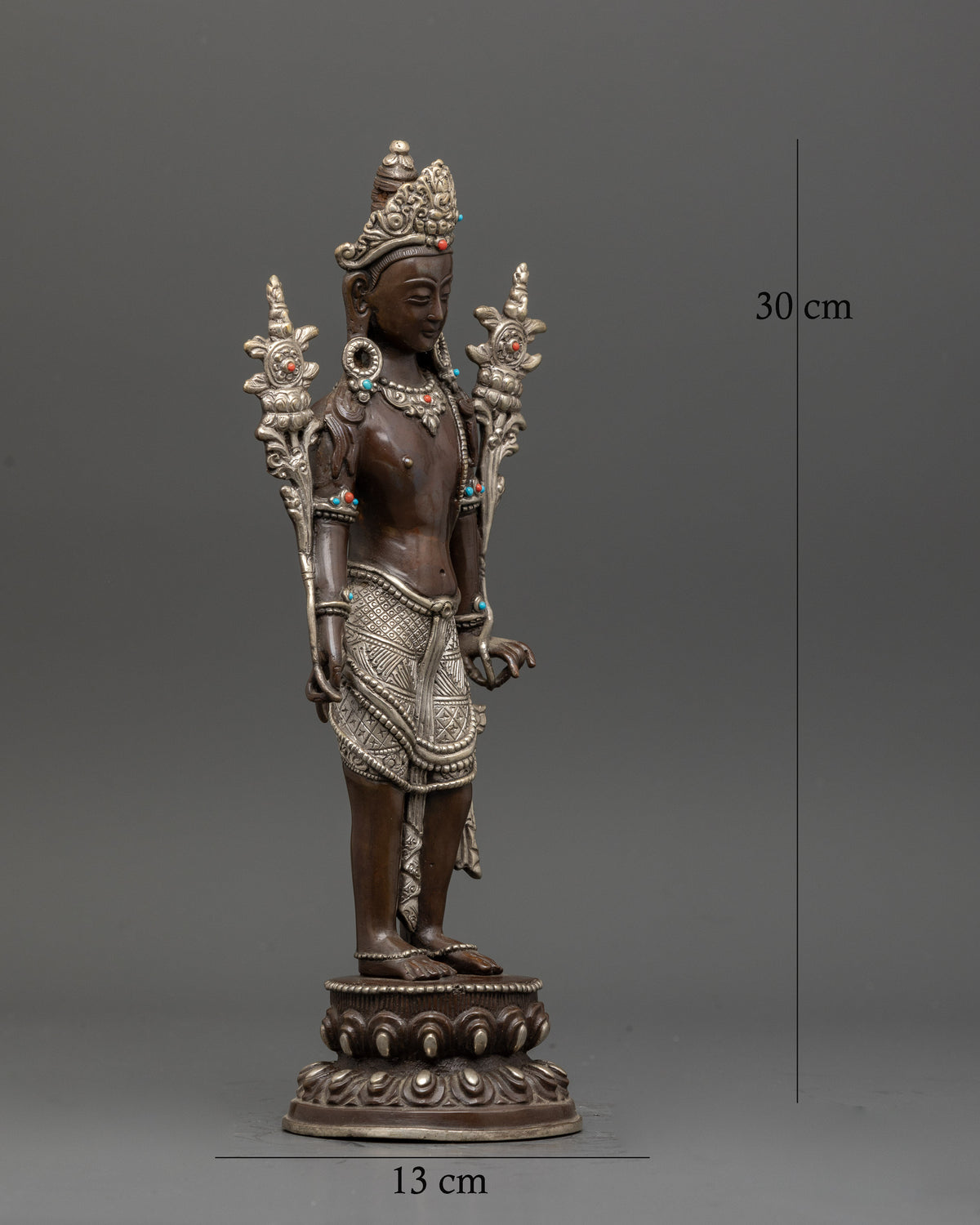 Padmapani Avalokiteshvara holding Utpala flower with five jeweled crown.