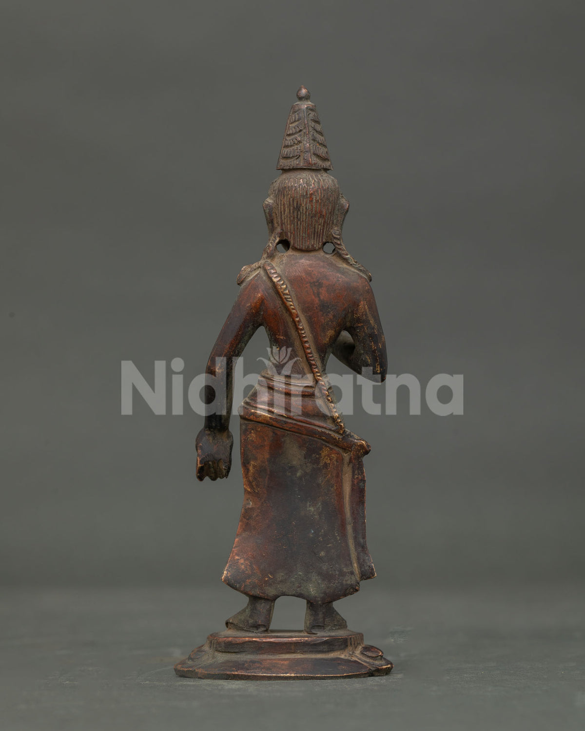 Padmapani Statue back view chemically oxidized copper Newari art Patan Nepal.