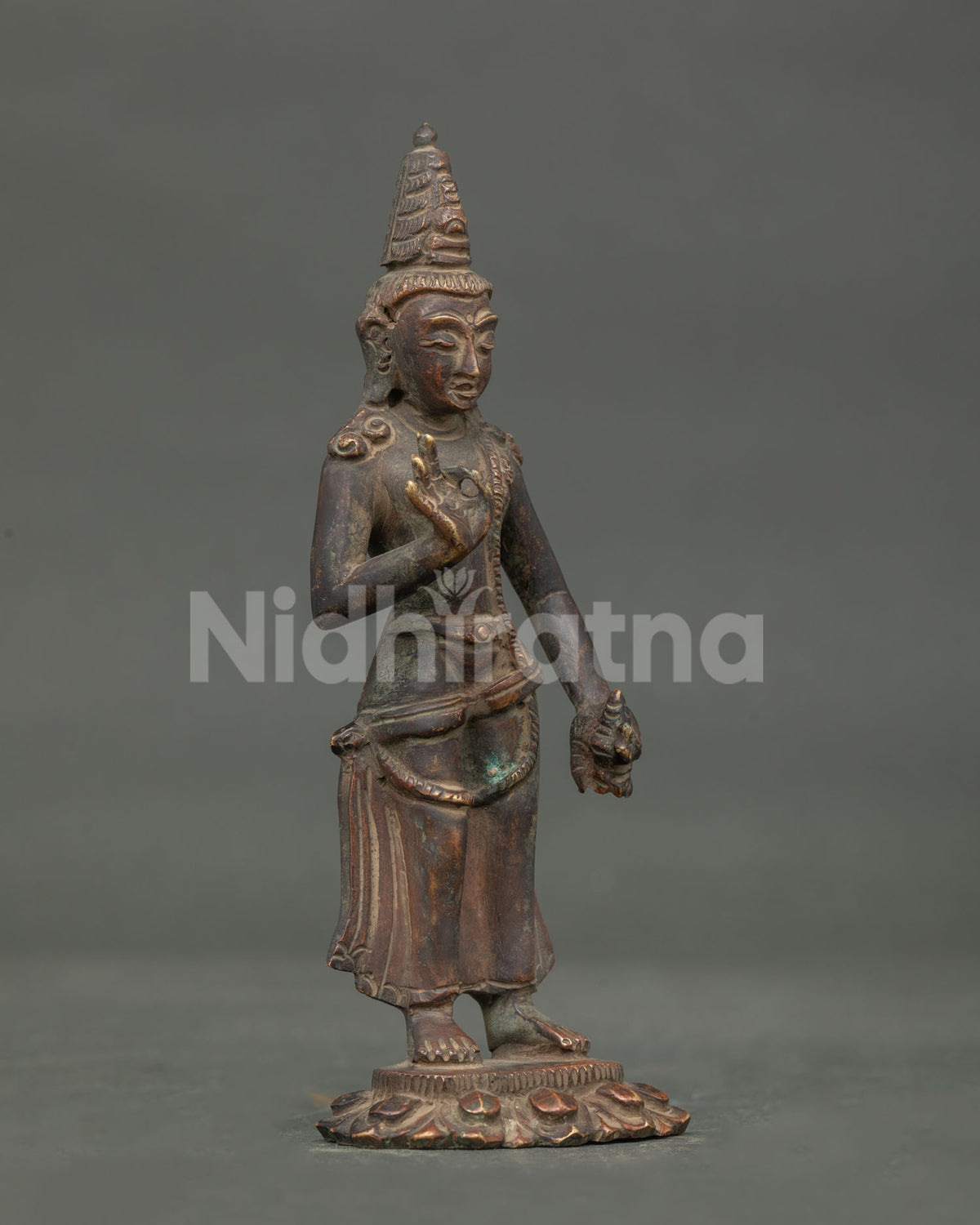 Padmapani Statue right side view Abhaya Mudra silk garment oxidized copper.