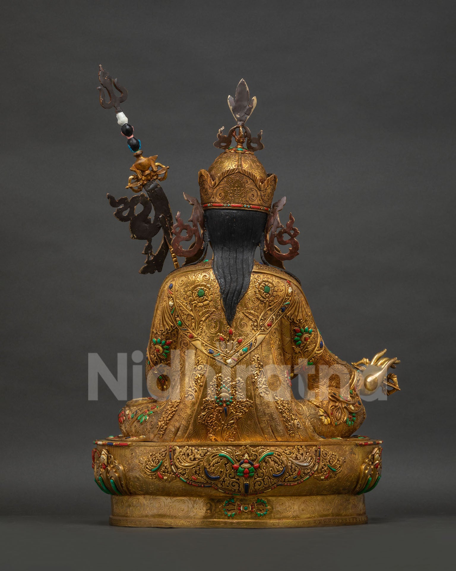Padmasambhava statue back view, hand-carved robe detail, solid copper, Newari craftsmanship