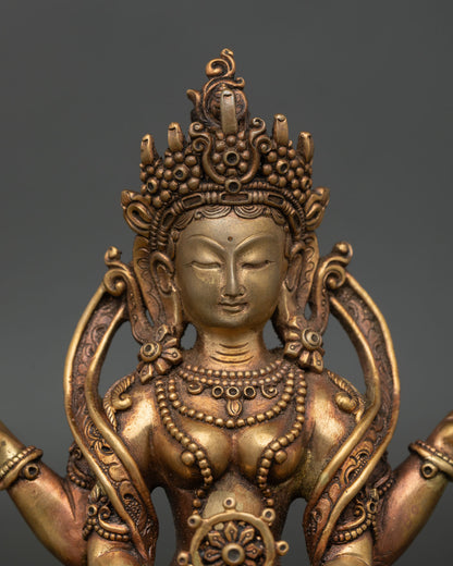 Prajnaparamita statue holding vajra and sacred scripture in upper hands.
