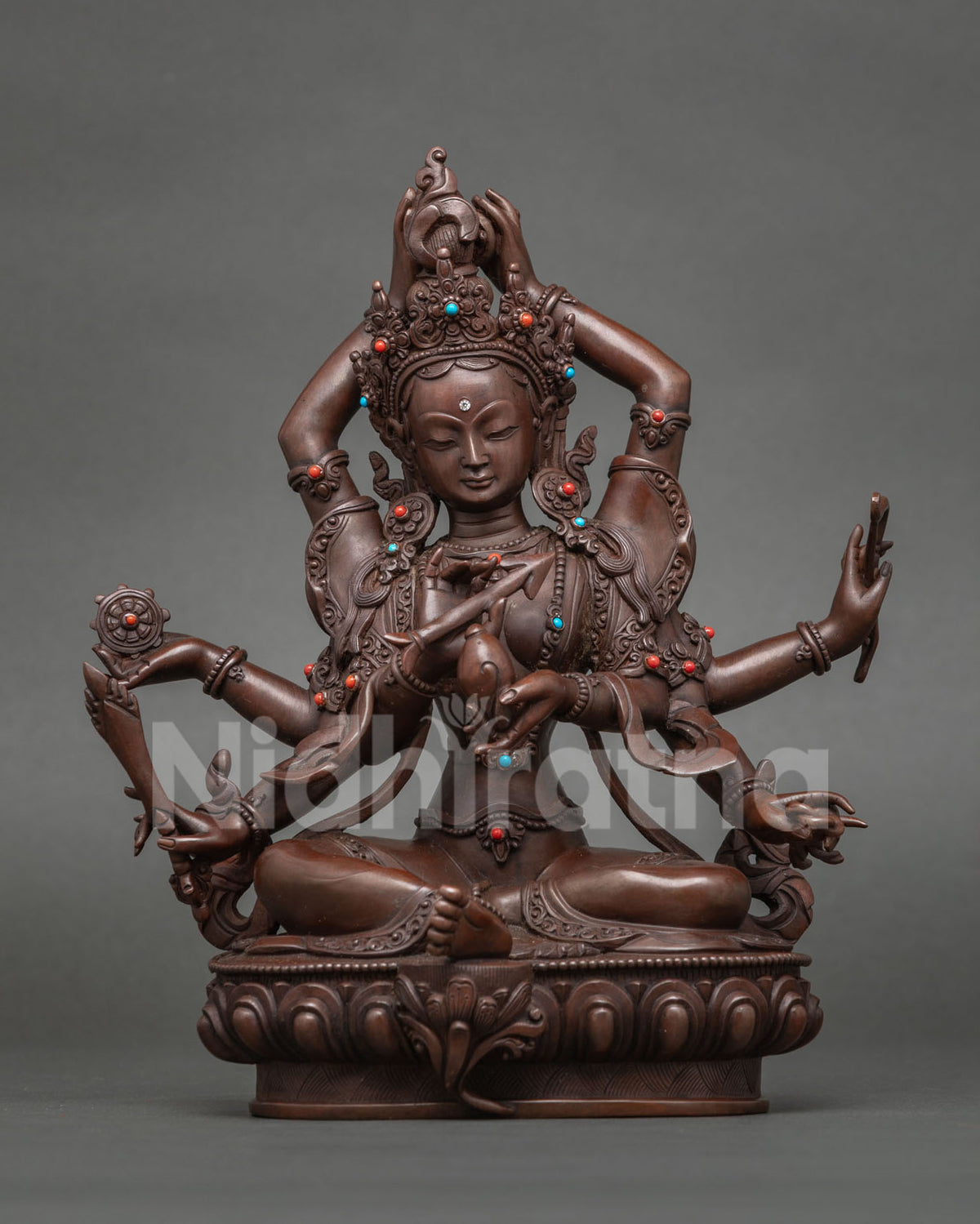 Pravira Tara statue, swift heroine with hands above her crown, oxidized copper, Nepal