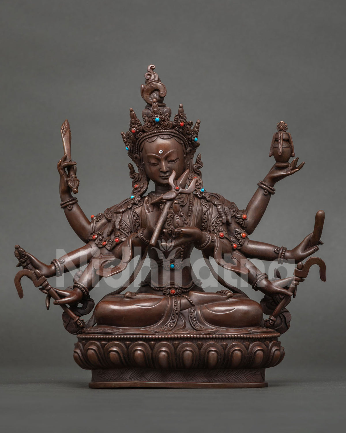 Raganisudani Tara statue, eight-armed destroyer of attachment, oxidized copper from Nepal