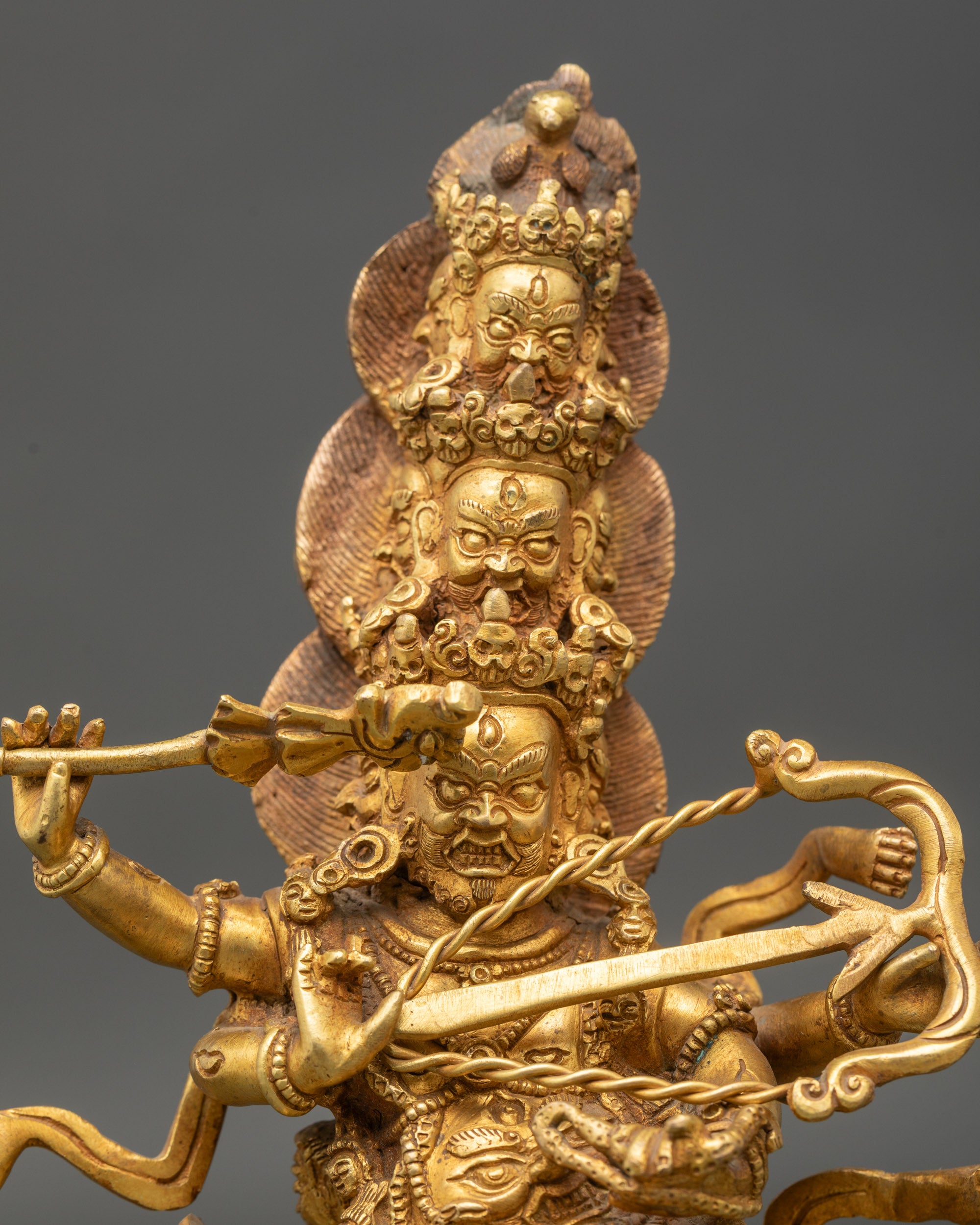 rahula-statue-close-up-nine-faces-skull-diadems-fire-halo-handcrafted-patan-nepal