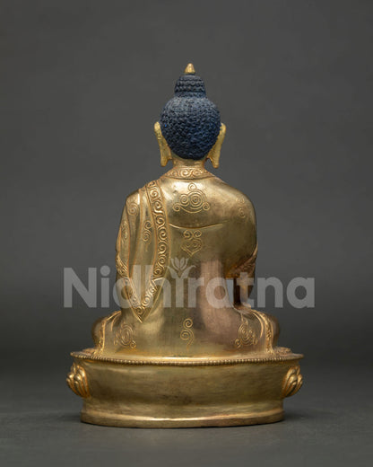 Ratnasambhava Buddha statue hand carved lotus pedestal monk robe
Files.