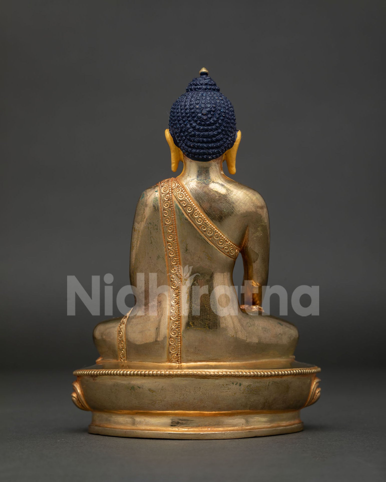 Ratnasambhava Buddha Statue Holding Sacred Bowl in Varada Mudra Handcrafted in Nepal.