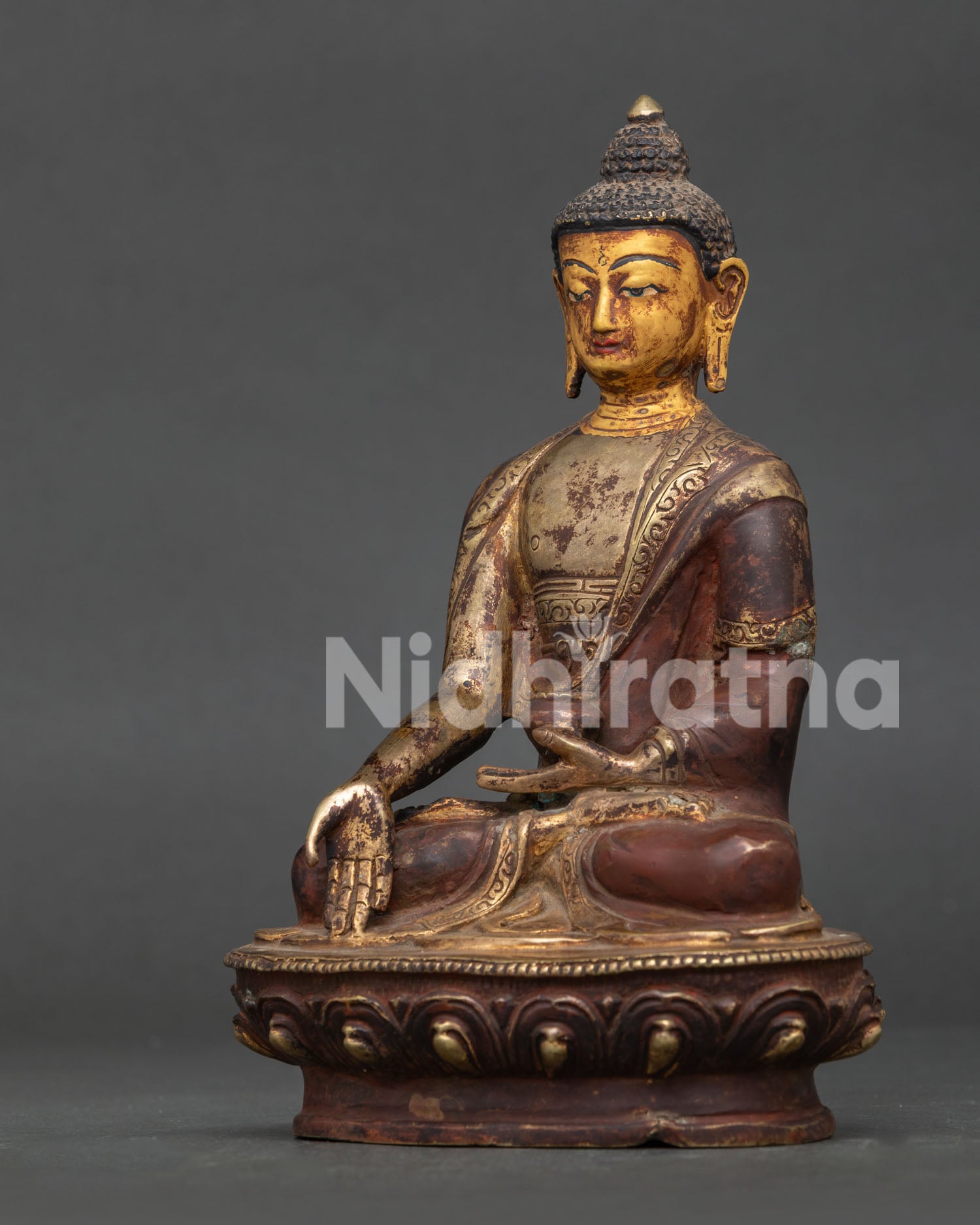 Ratnasambhava Buddha Statue Showing Varada Mudra and Handcarved Details.
