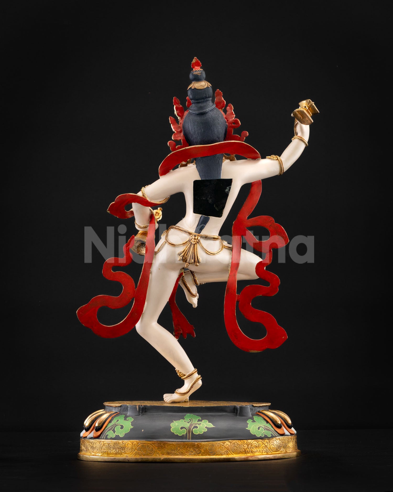 Rear angle of Machig Labdron Statue revealing flowing scarves and metalwork details