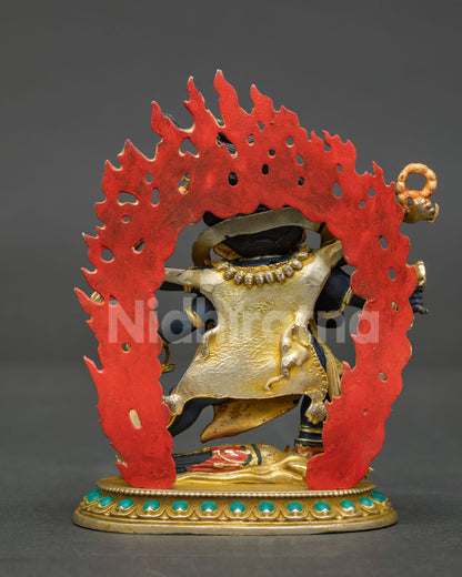 Rear of Six-Armed Mahakala Buddhist statue showing tiger-skin garment and six arms