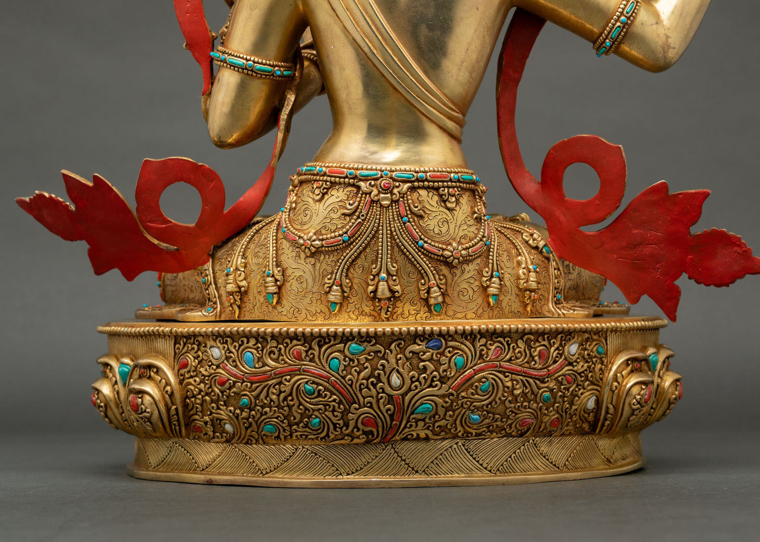 Rear pedestal detail of Nepalese Manjushri Statue with intricate floral carvings