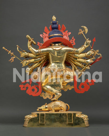 Rear view gold Ganesh statue with unpainted red aureole backdrop