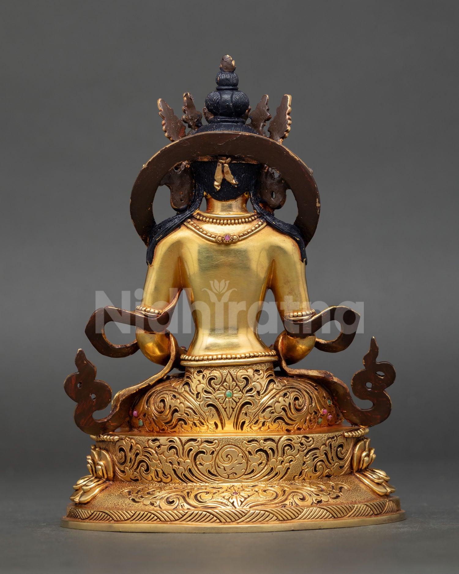 Rear view of Amitayus Statue highlighting detailed robe and artisan craftsmanship