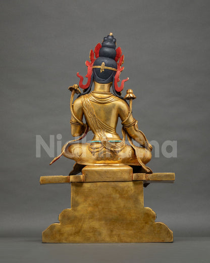 Rear view of Green Tara meditation statue with gold gilded copper body and hand-painted hair