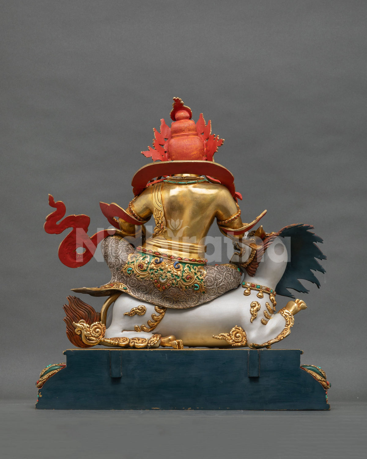 Rear view of Namtoshe statue with carved flaming halo and jeweled parasol, Himalayan Buddhist art