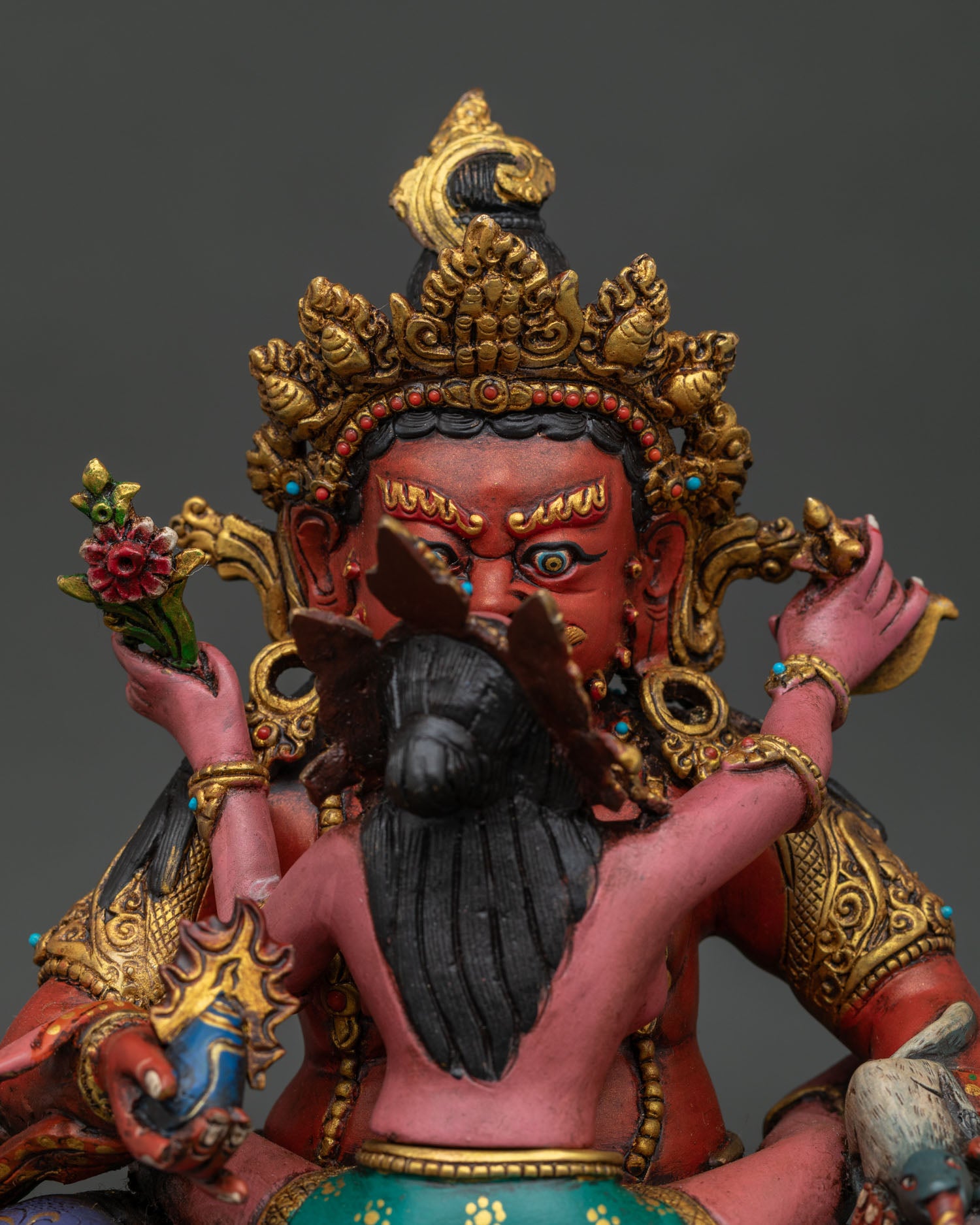 Red Dzambhala Yab Yum Statue regular close up with gold gilded details and stones