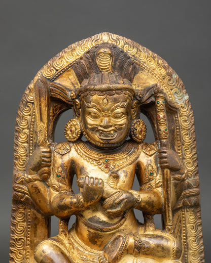 regular-close-up chaturbhuja mahakala statue showing intricate copper and gold details