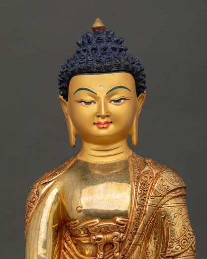 Regular Close-Up Gold-gilded Shakyamuni Buddha copper statue, intricate robe engravings, Newari craftsmanship Nepal