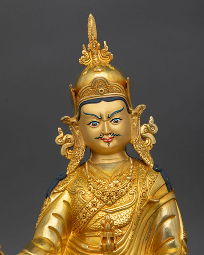 Regular close-up of Guru Rinpoche Statue showing intricate copper and gold details