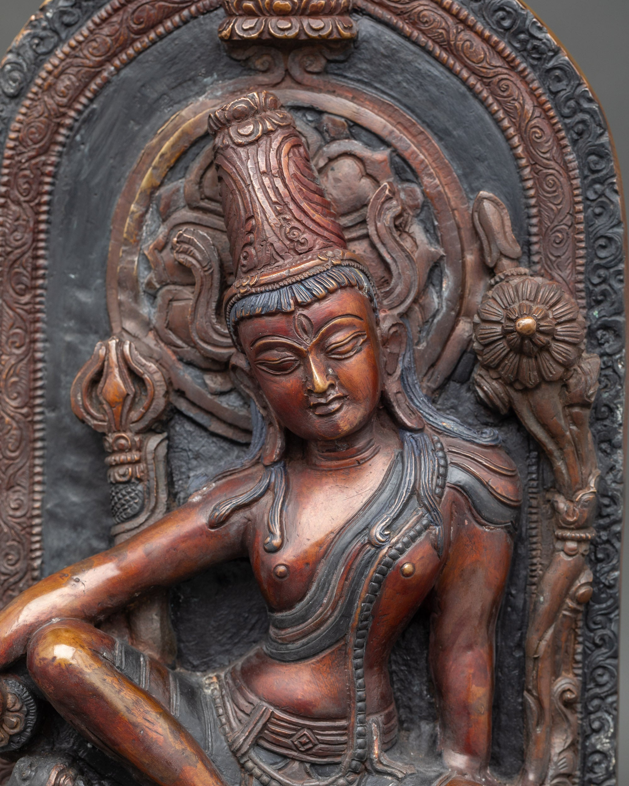 Regular close-up of Lokeshwor statue showing detailed crown and jewelry craftsmanship