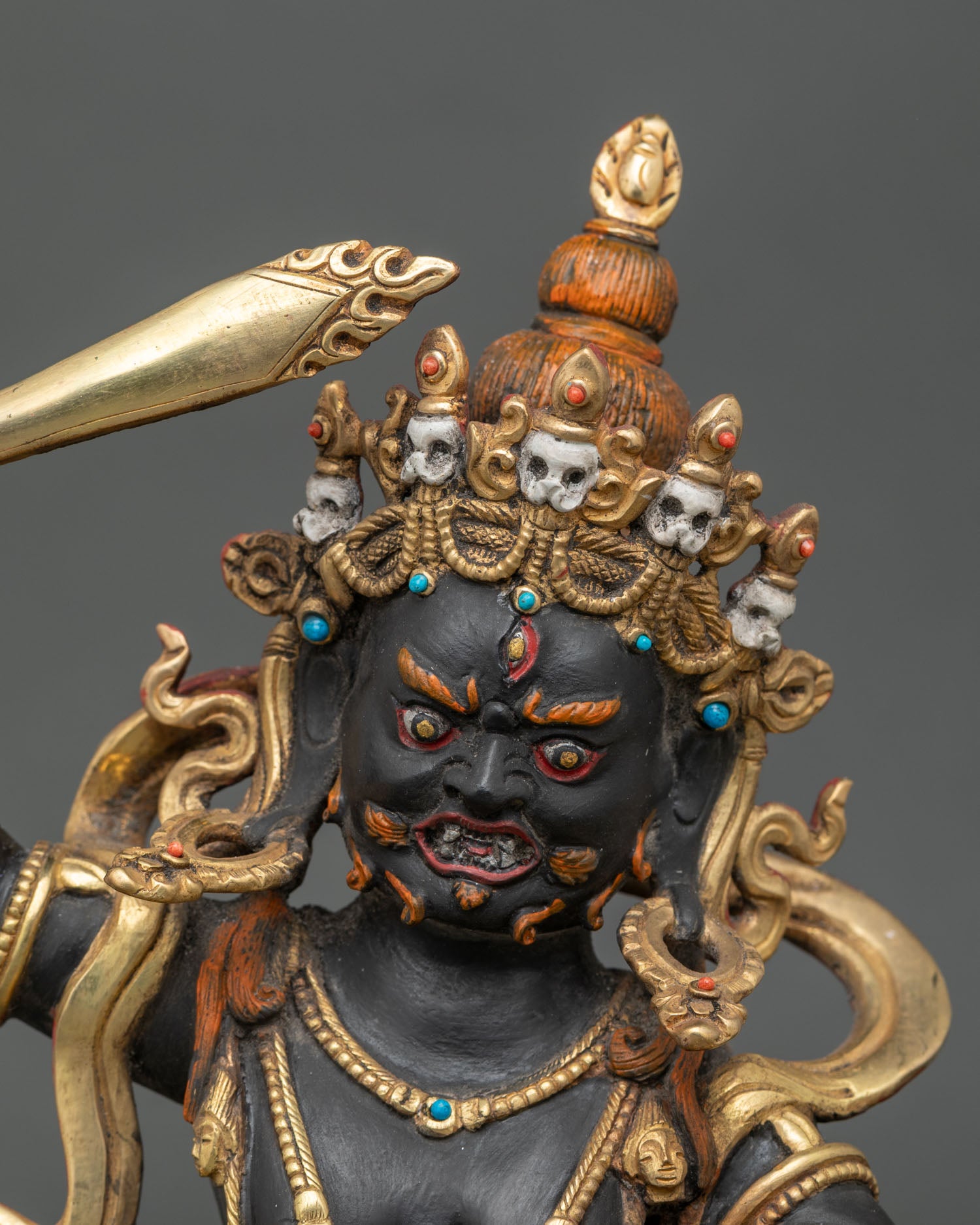 Regular close-up of Black Manjushri Statue showing detailed copper and acrylic features