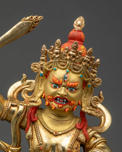 Regular close-up of Black Manjushri statue showing detailed copper and gold features