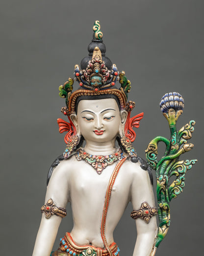 regular close up of chenrezig bodhisattva statue showing hand-painted details