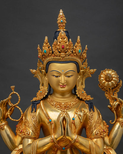 Regular close up of Chenrezig statue showing four arms lotus rosary and wish fulfilling jewel