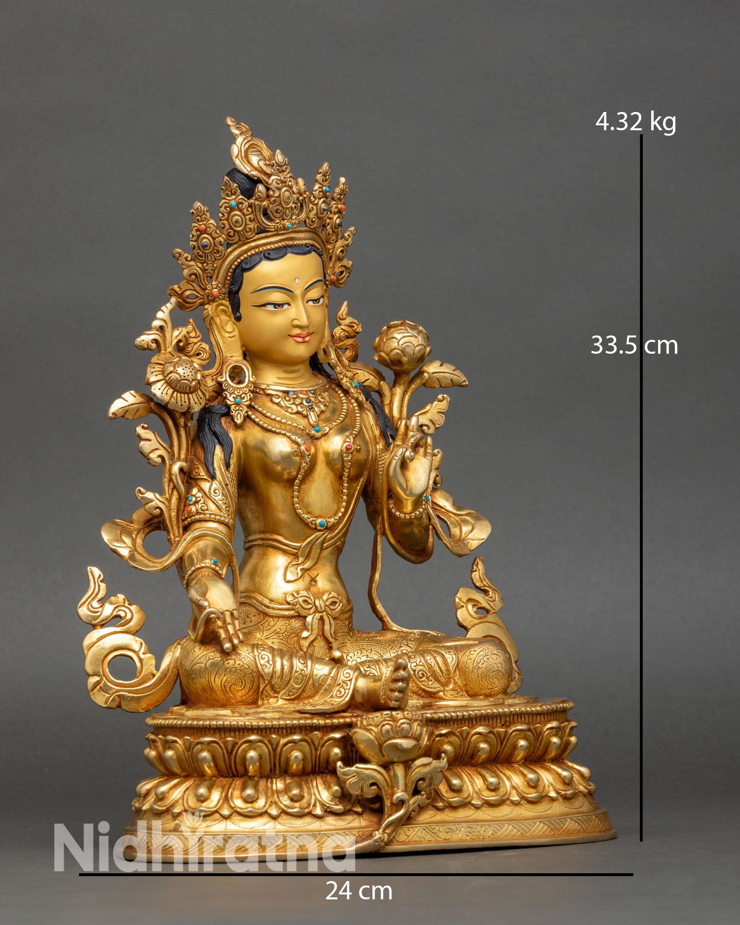 regular close up of green tara sgrol ljang statue showing intricate copper and gold details