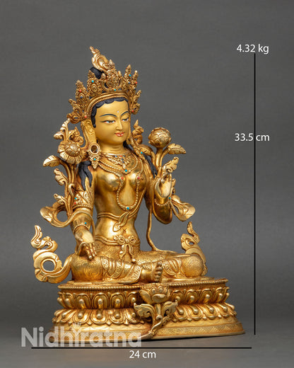 regular close up of green tara sgrol ljang statue showing intricate copper and gold details