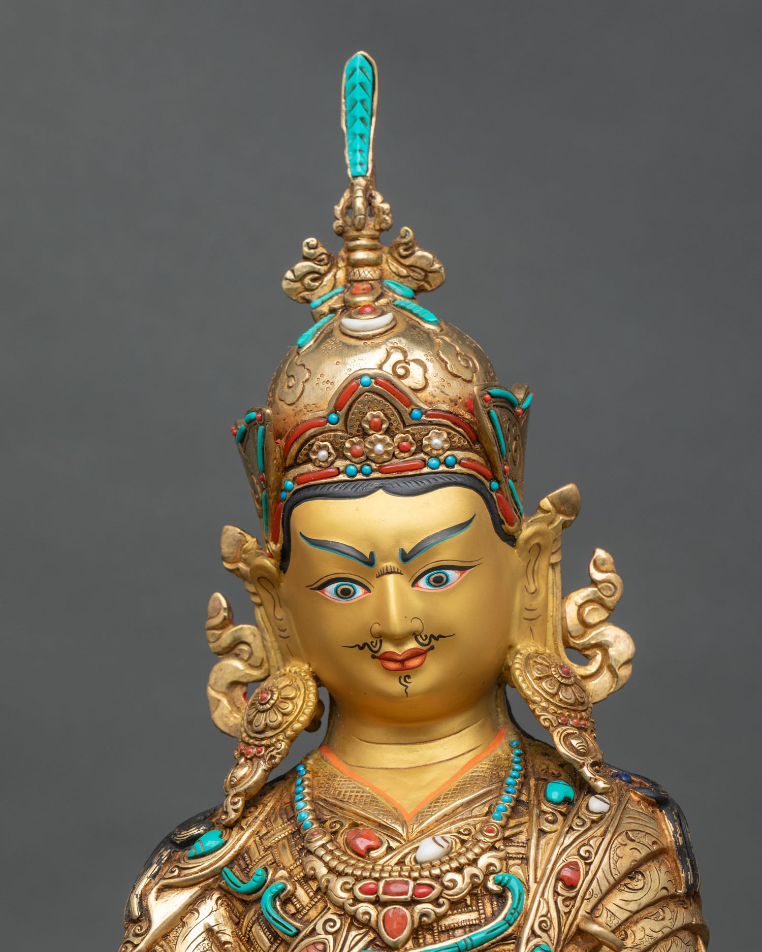 Regular close-up of Guru Rinpoche statue, handcrafted Nepalese Buddhist altar art