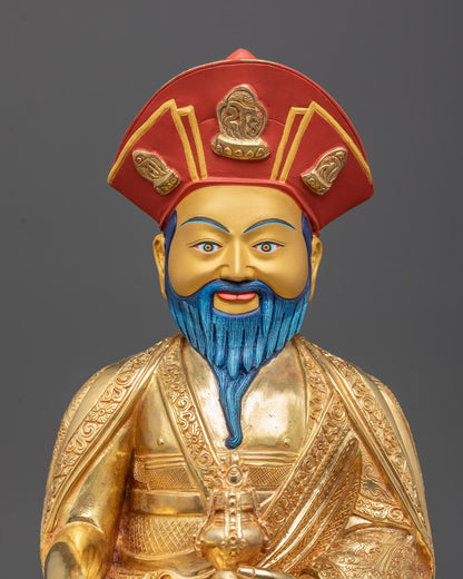 Regular close-up of Shabdrung Rinpoche statue showing intricate Himalayan craftsmanship and gold highlights