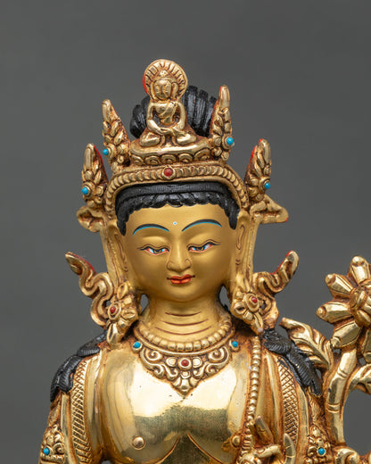 Regular close-up of Standing Chenrezig Bodhisattva, intricate gold and stone details
