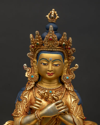 Regular close up of Vajradhara Statue with copper craftsmanship and sacred Buddhist details