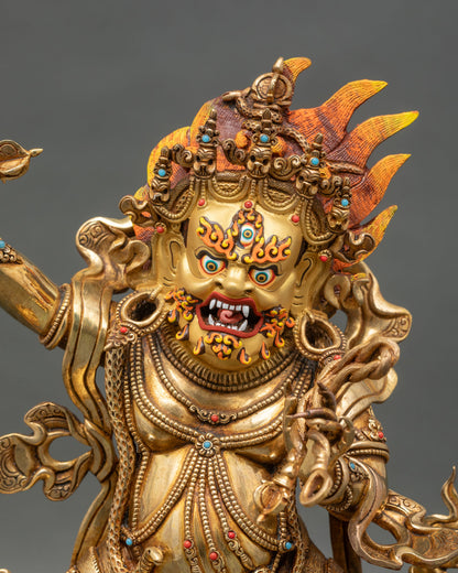 regular close up of vajrapani statue showing copper and gold details