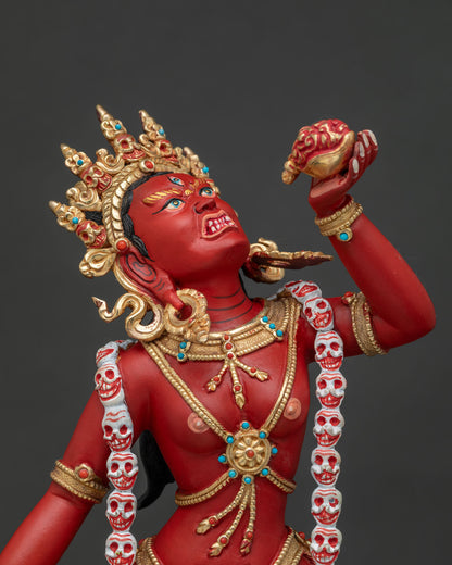 Regular close up of Vajrayogini Buddhist statue with ornate jewelry and lotus base