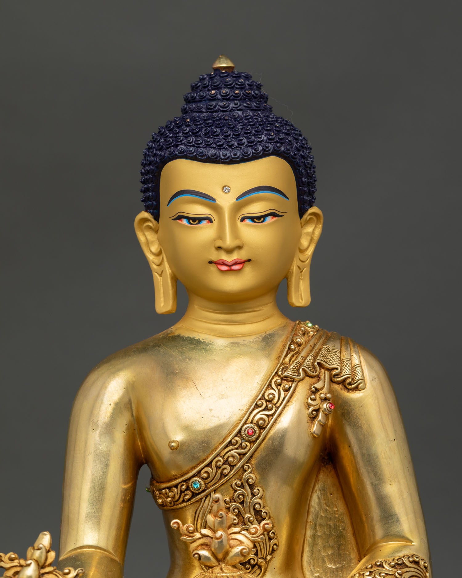 Sangye Menla copper statue close-up, 24K gold gilding, turquoise inlay, chased robe — Newari craft