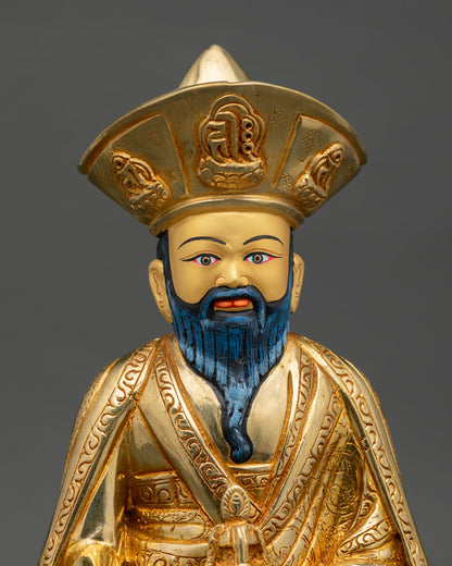 regular close up zabdrung ngawang namgyal statue intricate copper details fire gilded