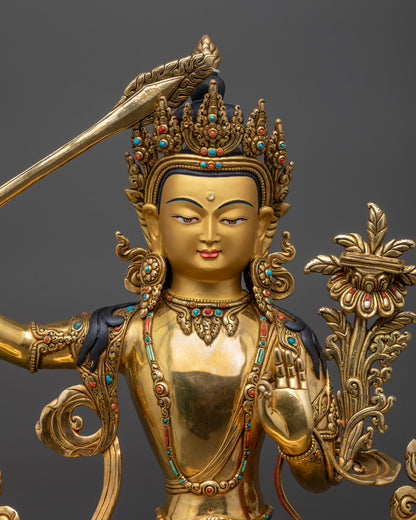 regular close up Manjushri Statue holding utpala flower with Prajnaparamita sutra and sword
