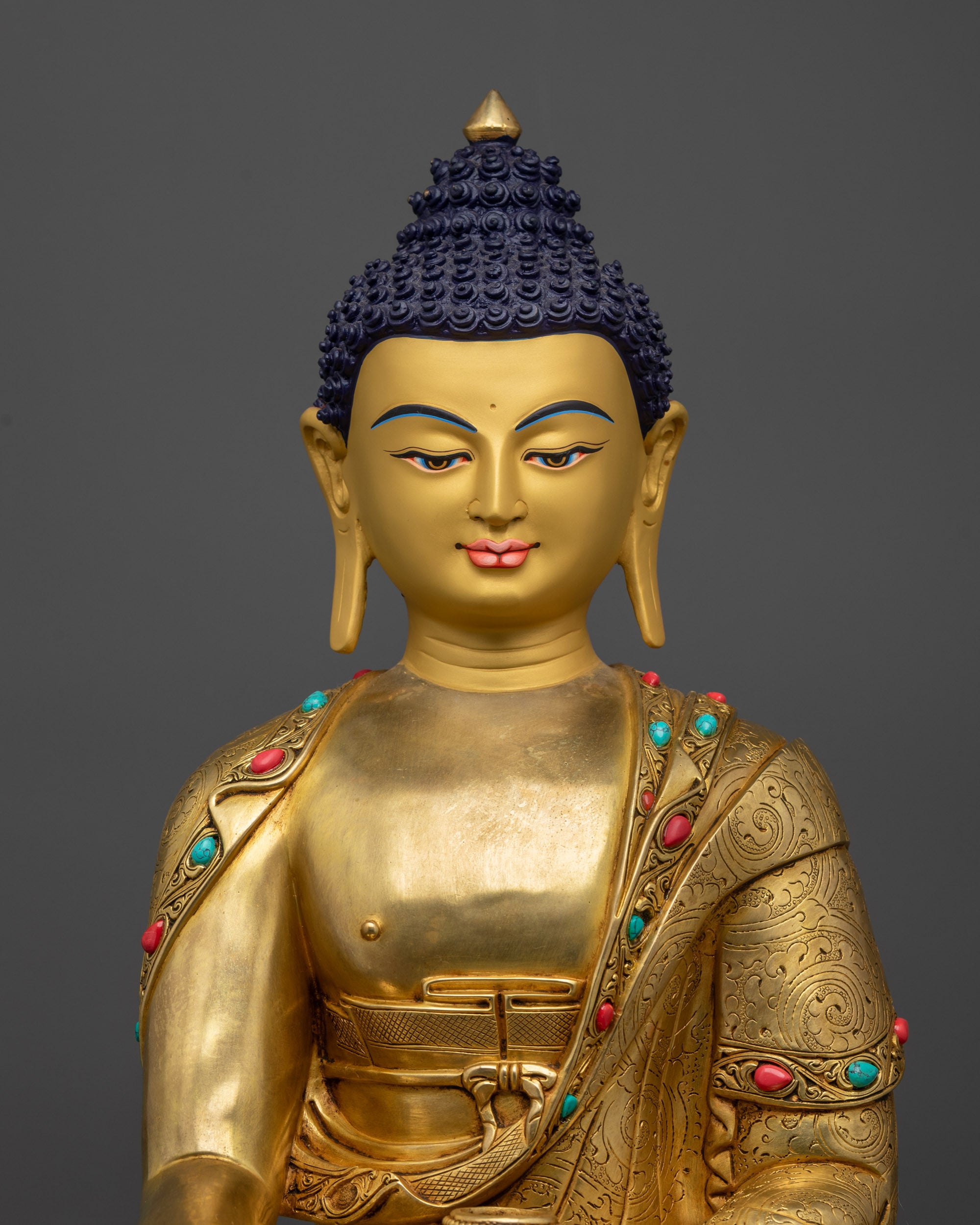 regular close up Shakyamuni Buddha statue showing earth-touching mudra and patra bowl