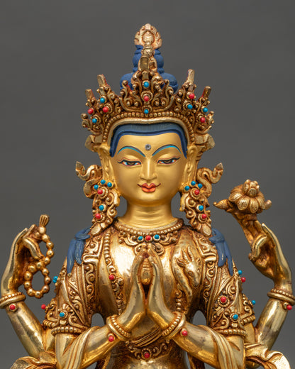 regular close up of Chenrezig statue showing copper craftsmanship and gemstones