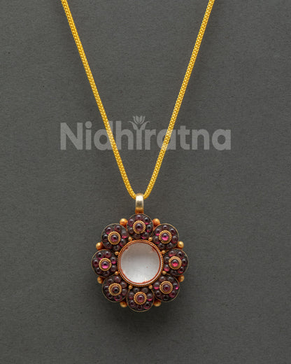 Rhodolite garnet flower locket handcrafted by Newari artisans in Patan, Nepal